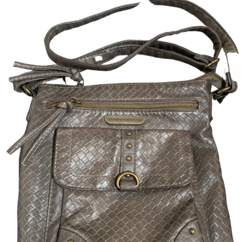 Never used purse.Very soft and lightweight.